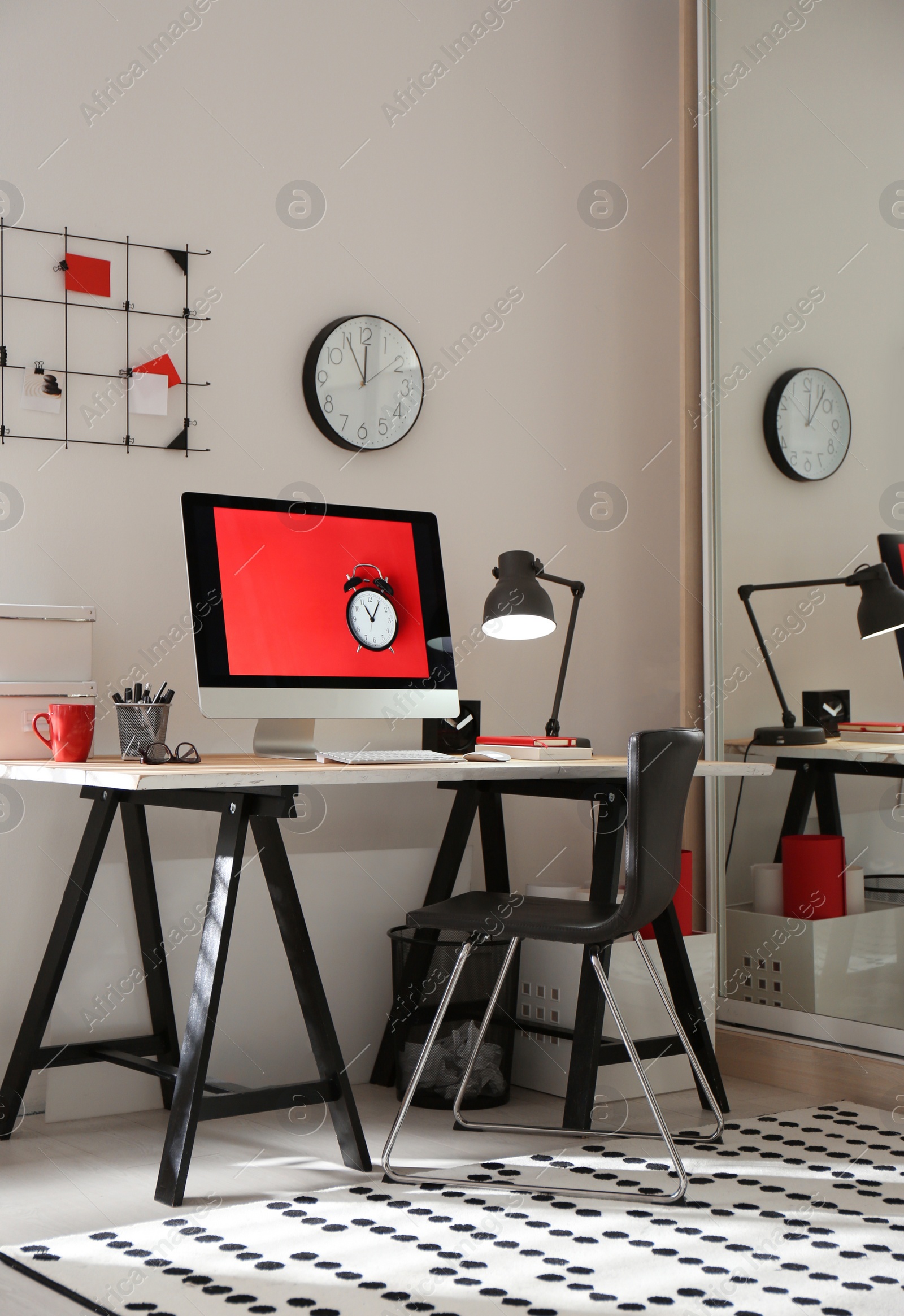 Photo of Modern computer on desk in room. Home workplace