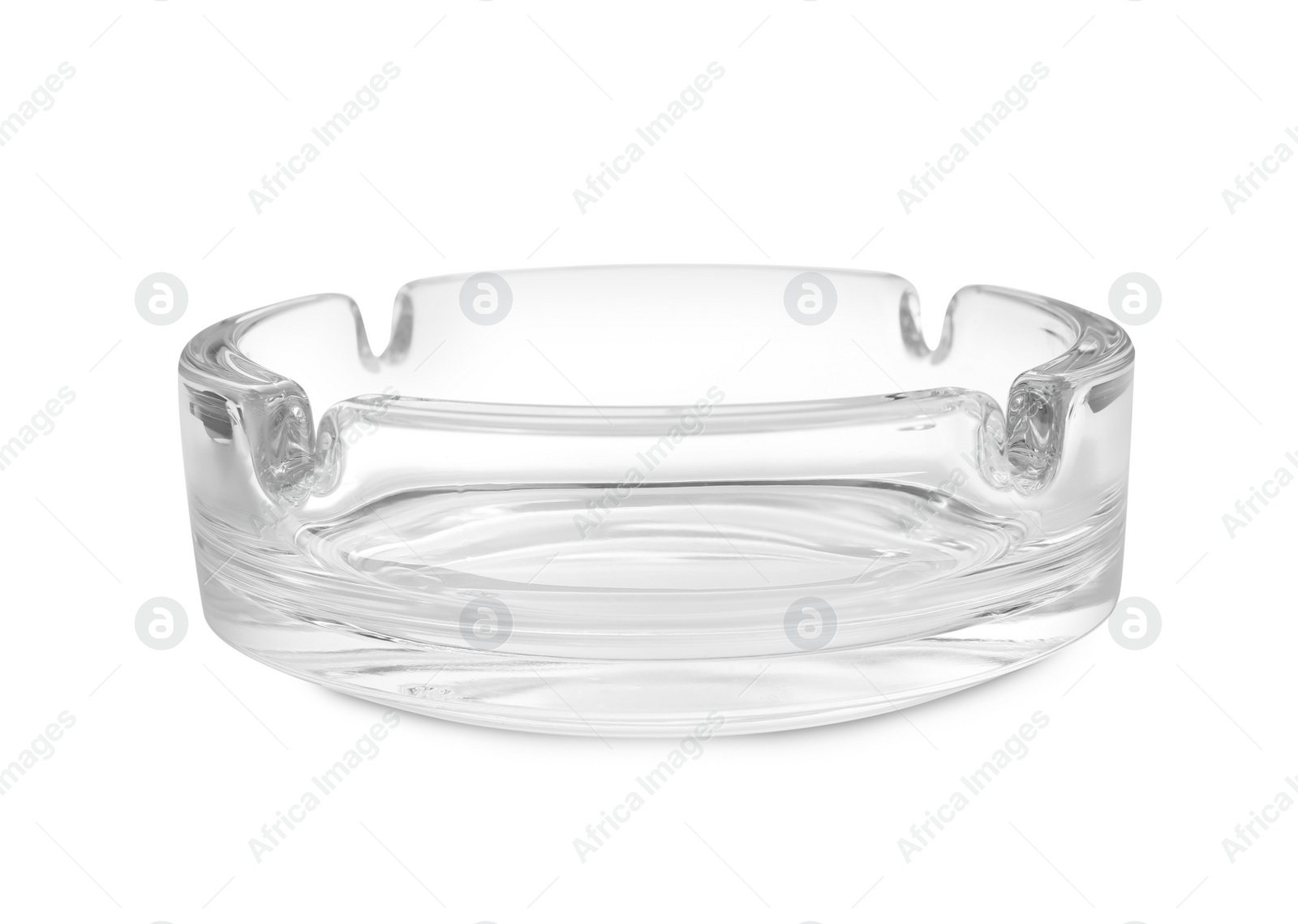 Photo of One empty glass ashtray isolated on white