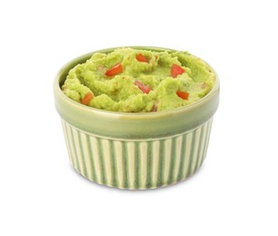 Bowl of delicious guacamole isolated on white