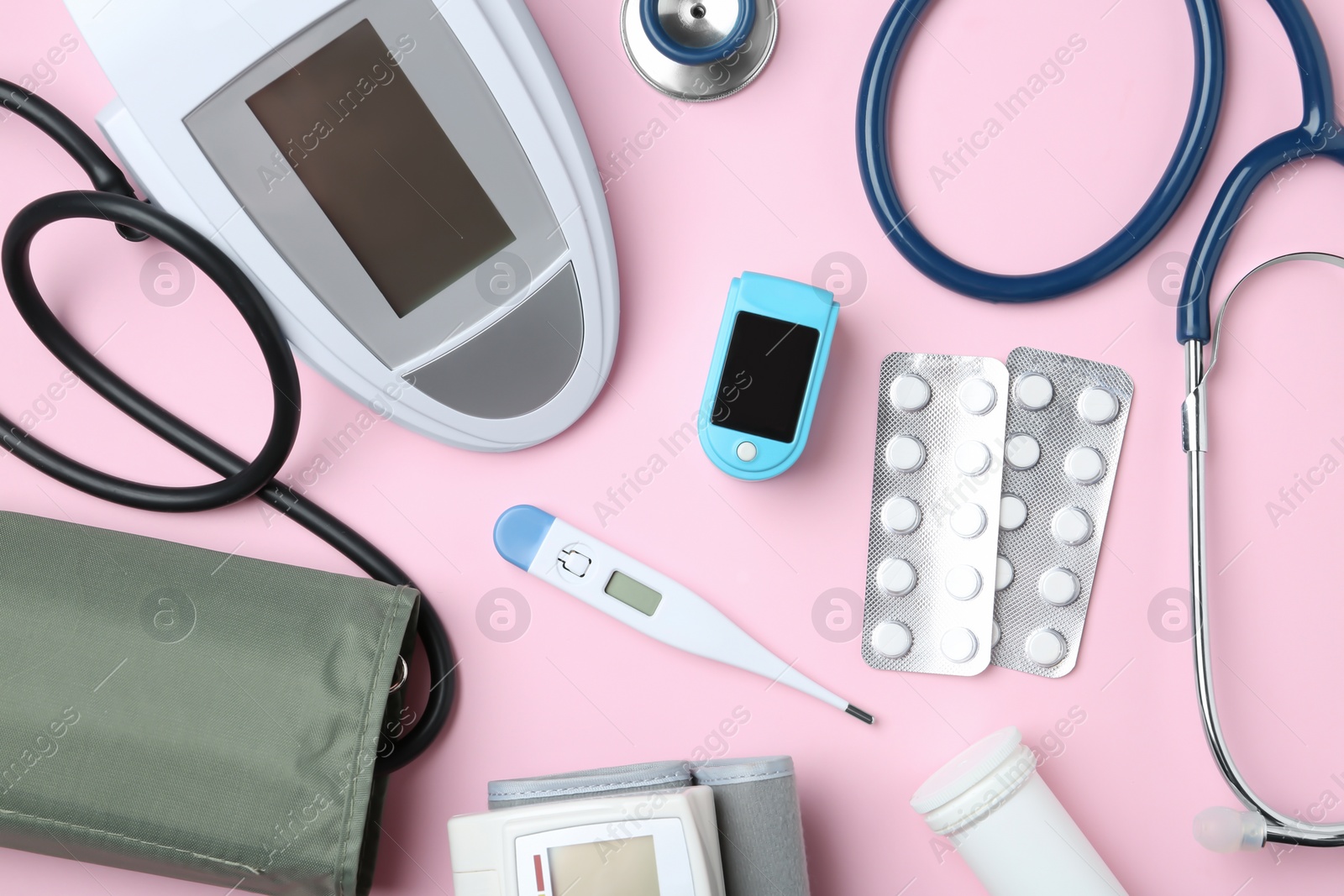 Photo of Flat lay composition with different medical objects on color background