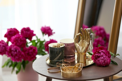 Composition with stylish accessories and interior elements on table indoors