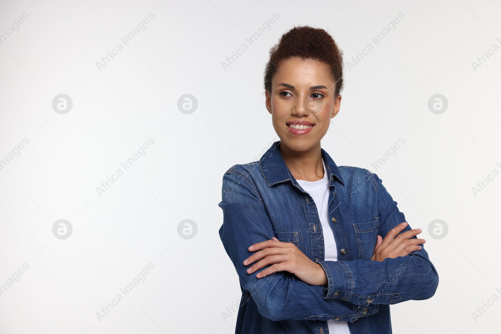 Photo of Portrait of beautiful young woman on white background. Space for text