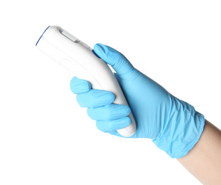 Doctor in latex gloves holding non-contact infrared thermometer on white background, closeup