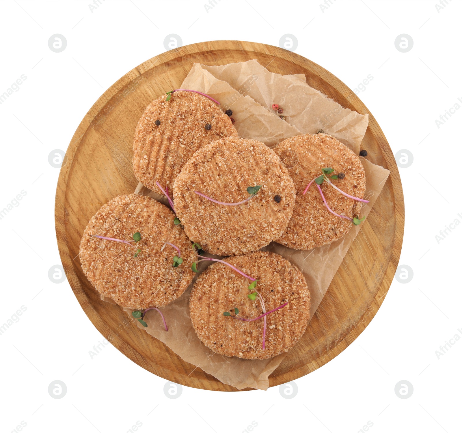 Photo of Vegan cutlets with breadcrumbs isolated on white, top view