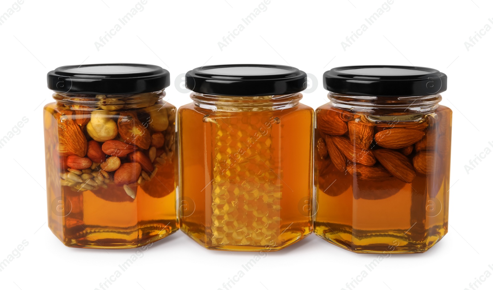 Photo of Jars with different nuts and honey on white background