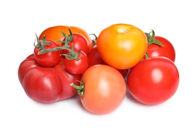 Photo of Many different ripe tomatoes on white background