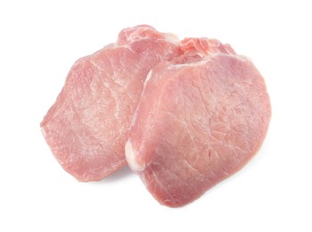 Photo of Pieces of raw pork isolated on white