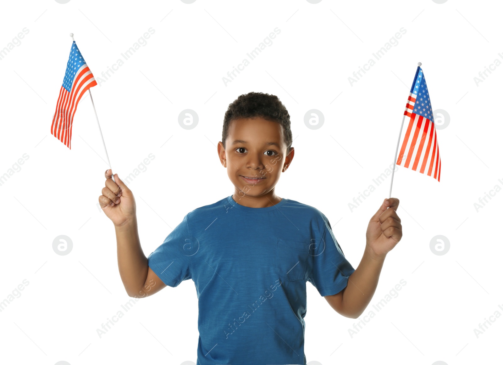 Photo of Happy African-American boy holding national flags on white background