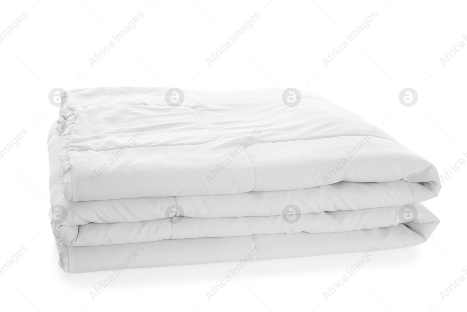 Photo of Folded clean blanket isolated on white. Household textile