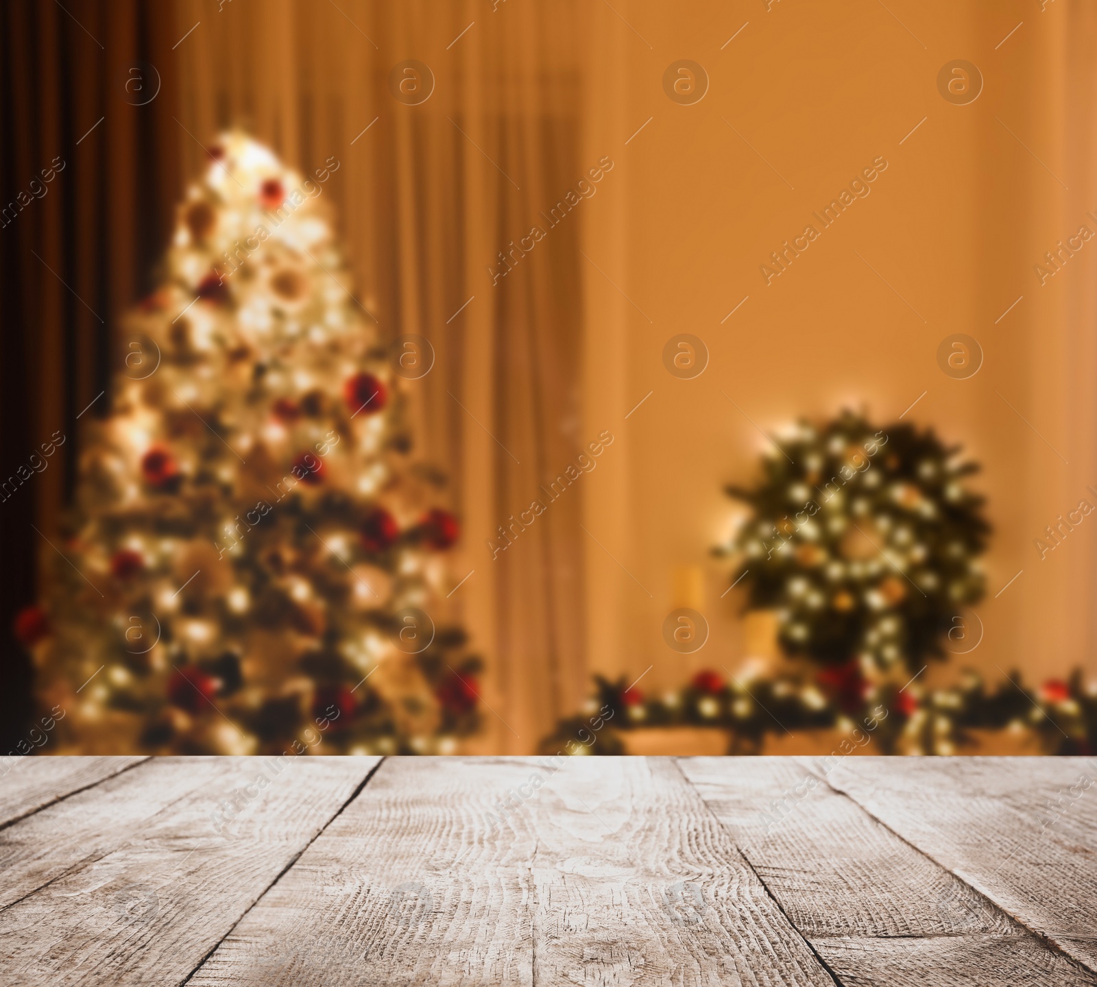 Image of Empty wooden surface and blurred view of room decorated for Christmas, space for text. Interior design