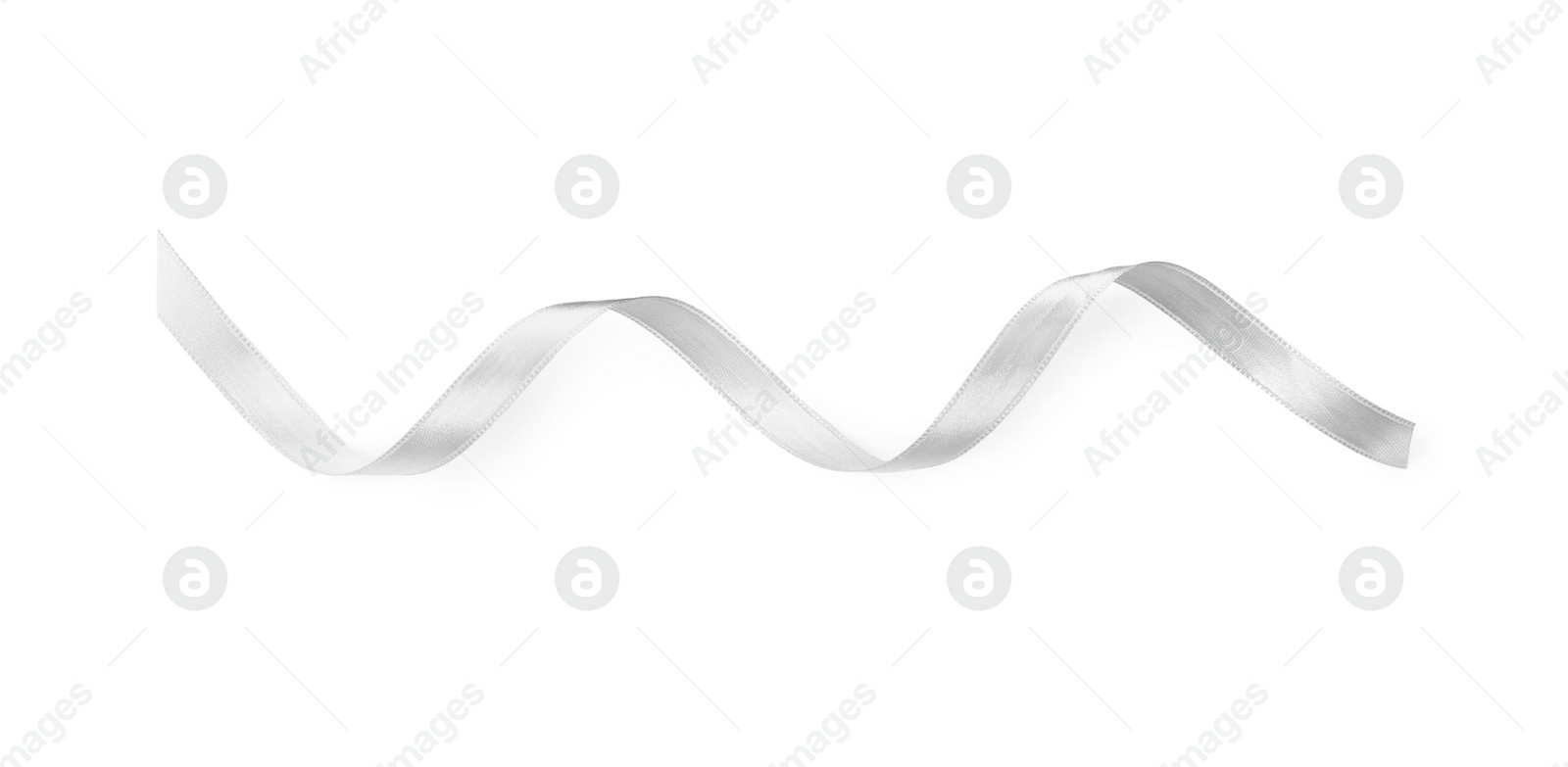 Photo of Silver satin ribbon on white background, top view