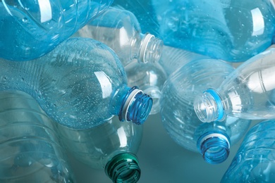 Photo of Many plastic bottles as background, closeup. Recycle concept