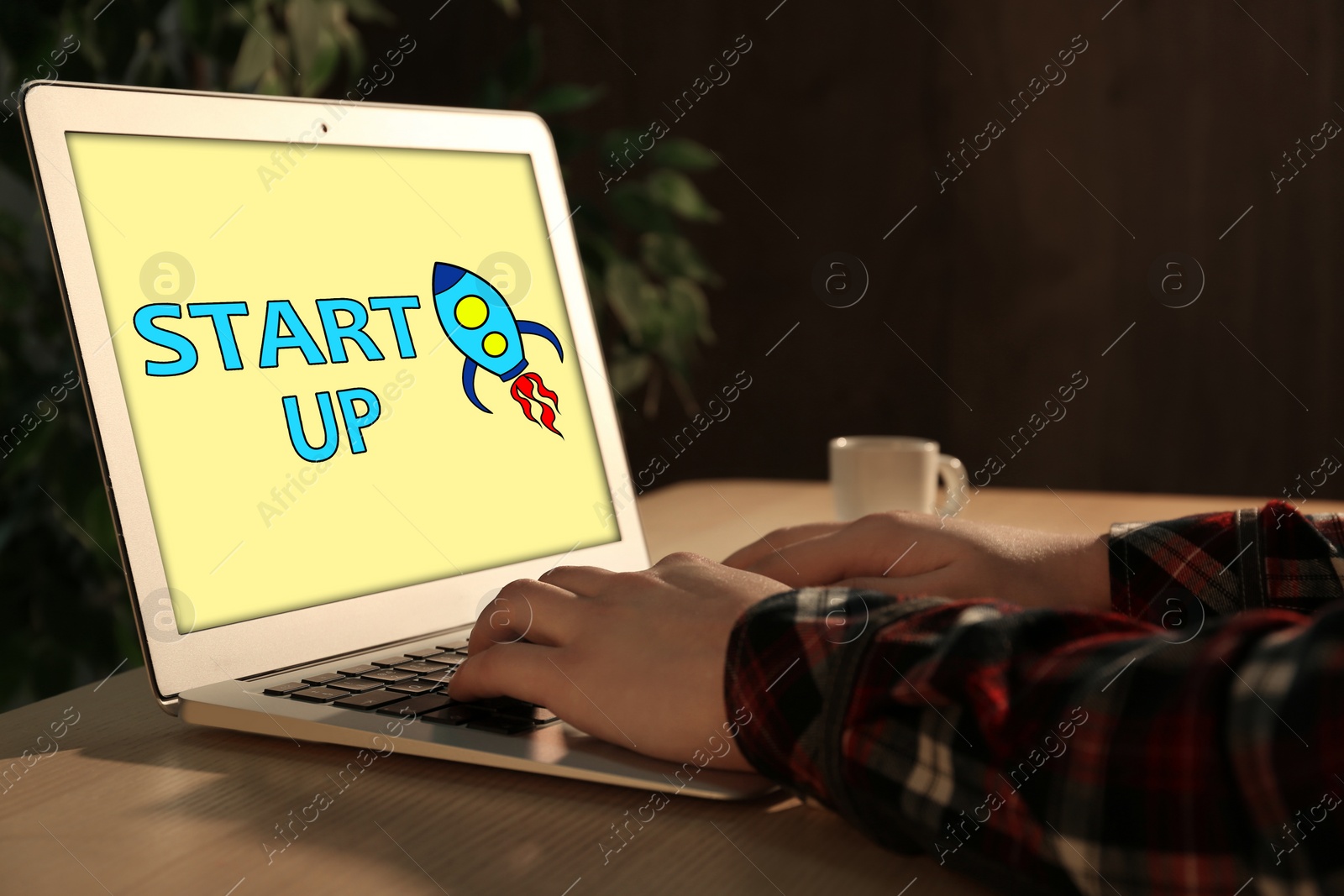 Image of Woman using laptop at desk in office, closeup. Startup idea