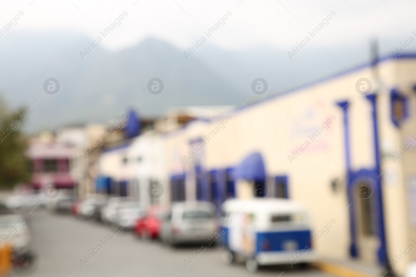 Photo of San Pedro Garza Garcia, Mexico – February 8, 2023: Blurred view of street with cars and beautiful buildings