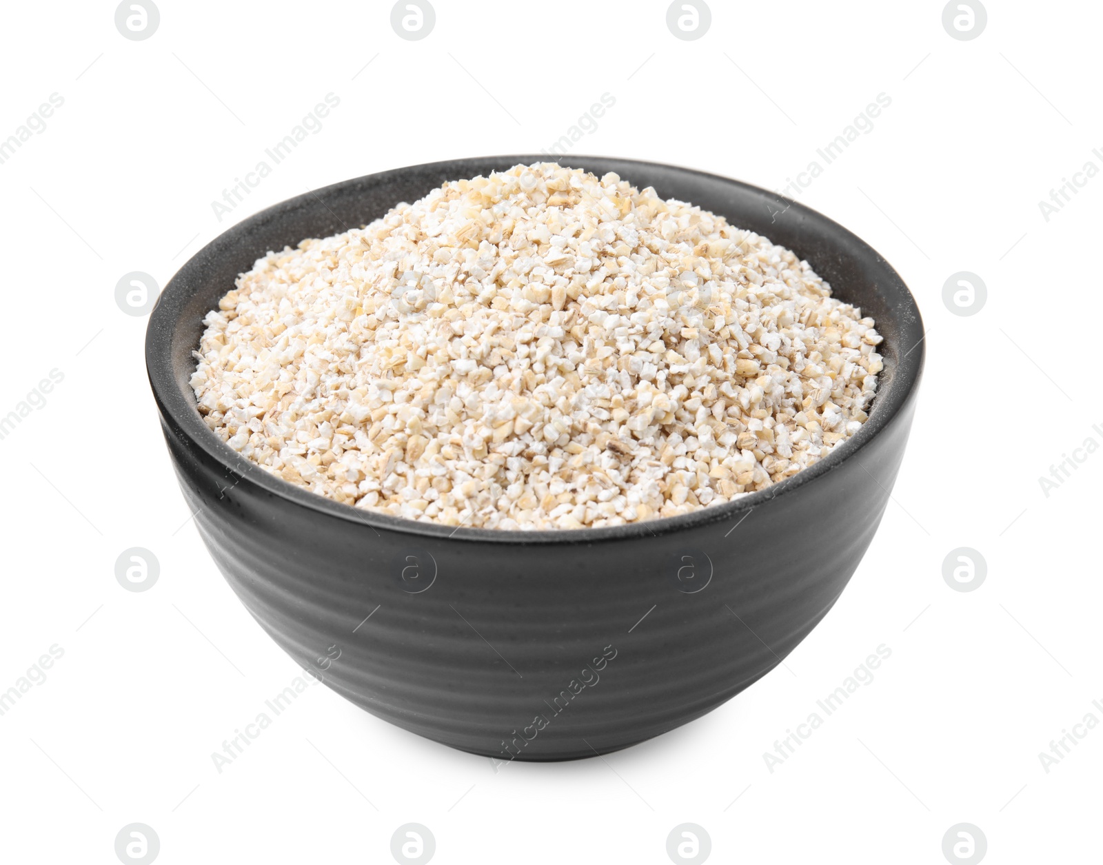 Photo of Dry barley groats in bowl isolated on white