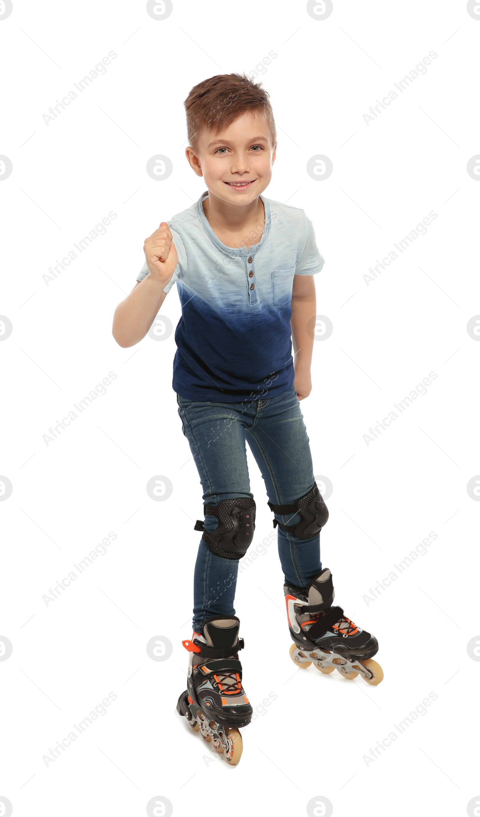 Photo of Little boy with inline roller skates on white background