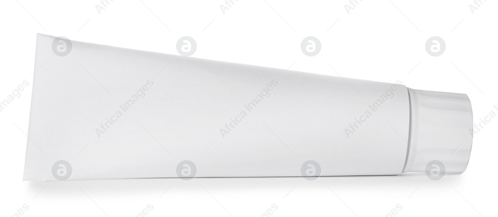 Photo of Blank tube of toothpaste isolated on white