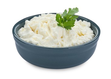 Photo of Delicious tofu cream cheese with parsley in bowl isolated on white