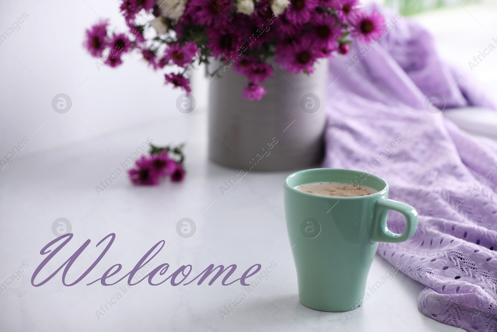 Image of Welcome card. Cup of aromatic coffee, beautiful flowers and violet cloth on white table