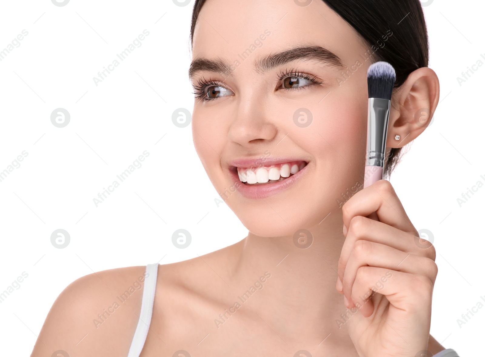 Photo of Teenage girl with makeup brush on white background