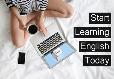 Young woman using laptop for online English learning with teacher at home, top view