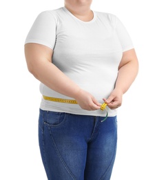 Photo of Overweight woman with measuring tape on white background