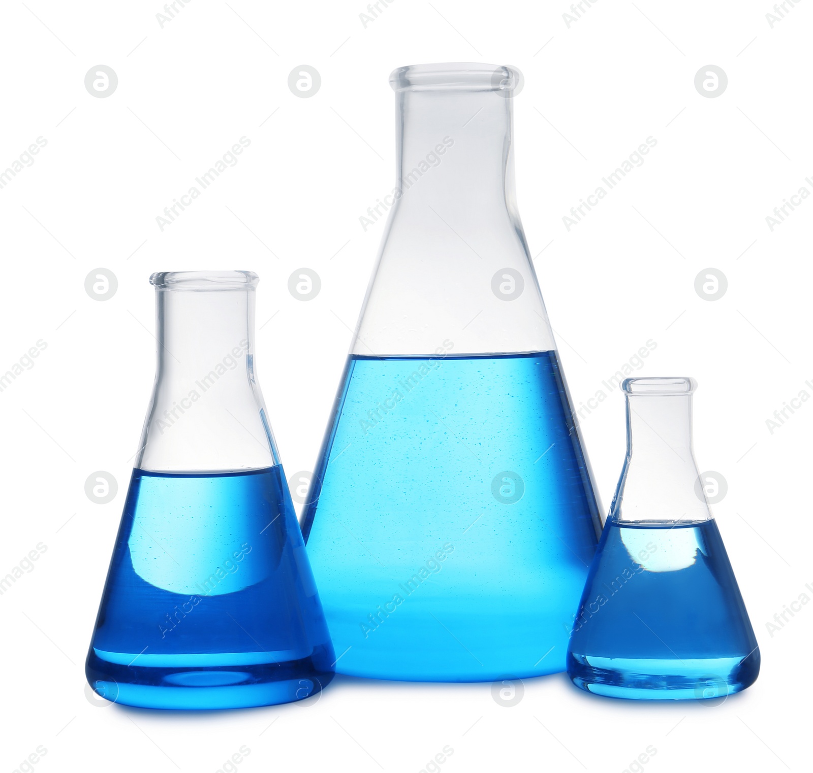 Photo of Conical flasks with blue liquid on white background. Laboratory glassware