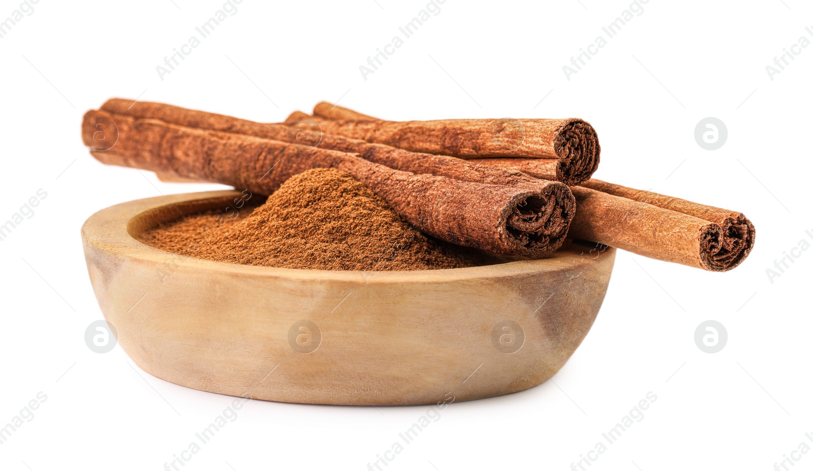 Photo of Dry aromatic cinnamon sticks and powder isolated on white