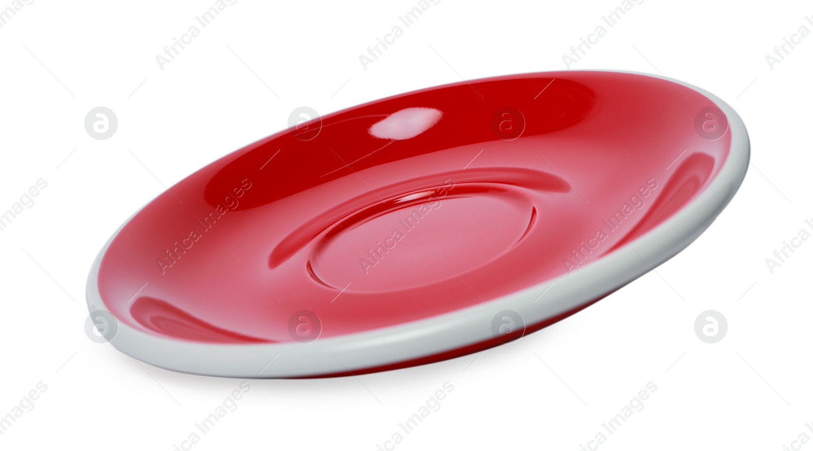 Photo of One red ceramic saucer isolated on white