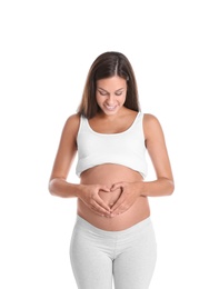 Happy pregnant woman posing on white background