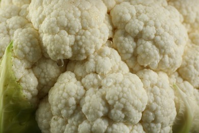 Photo of Closeup view of fresh whole cauliflower as background