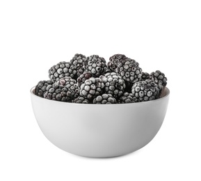 Tasty frozen blackberries in bowl isolated on white