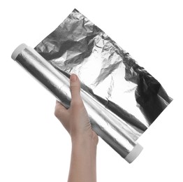 Woman holding roll of foil paper on white background, closeup