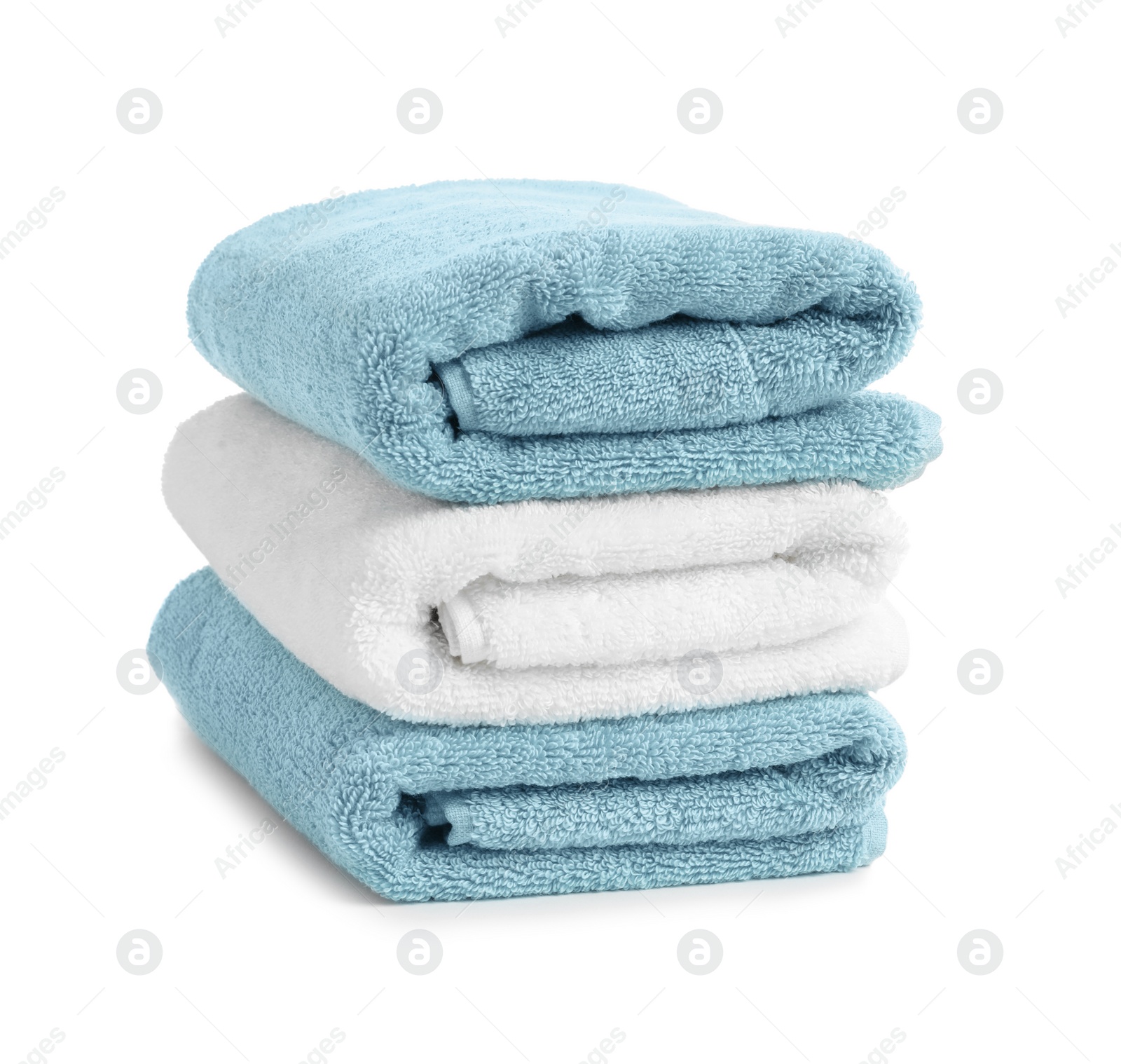 Photo of Stack of clean soft towels on white background