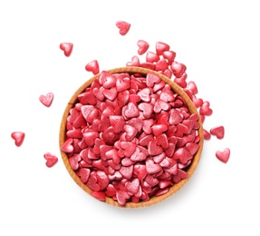 Photo of Sweet candy hearts in bowl on white background, top view