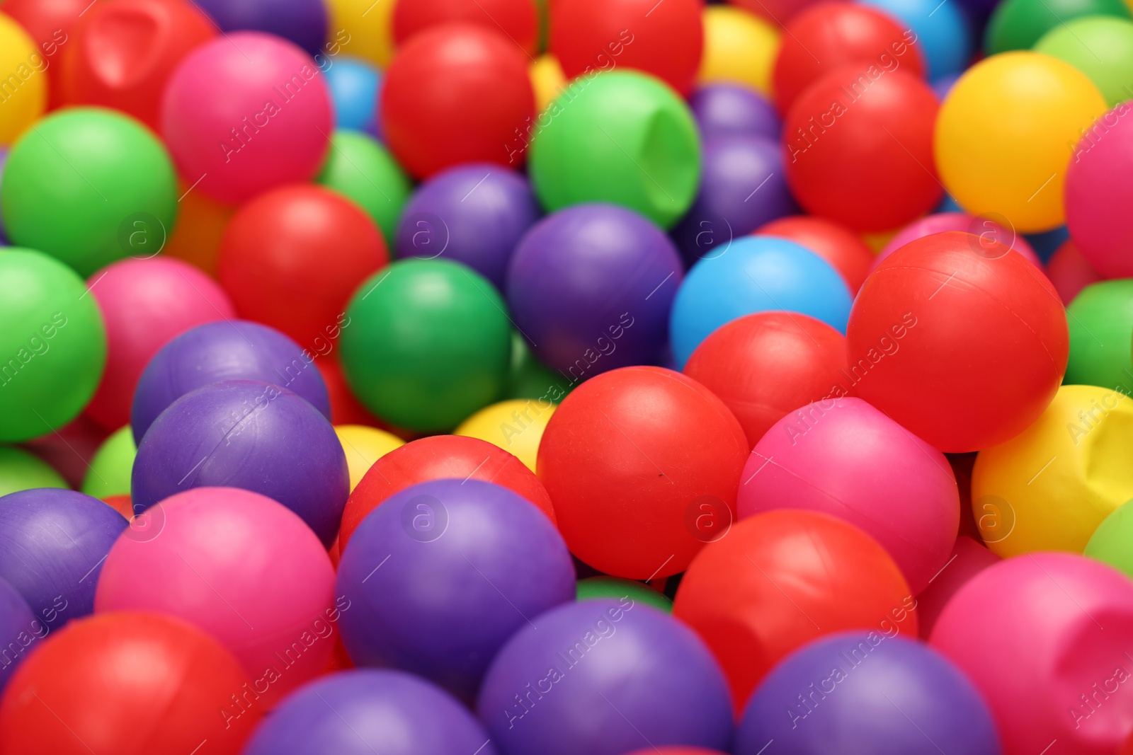 Photo of Many colorful balls as background, closeup. Kid's playroom