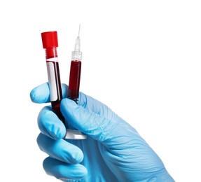 Photo of Nurse holding syringe and sample tube with blood on white background, closeup