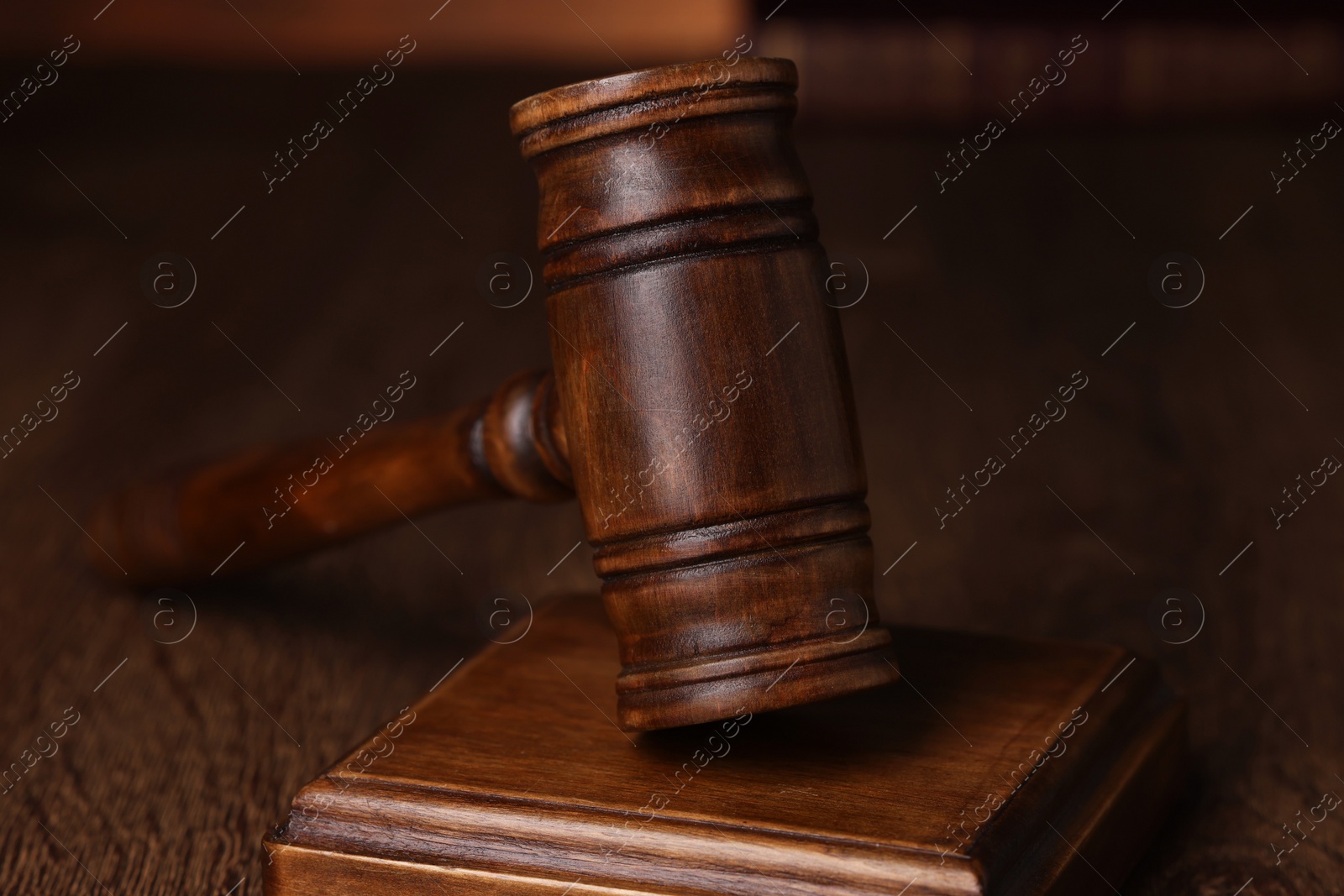 Photo of Law concept. Judge's gavel on wooden table, closeup