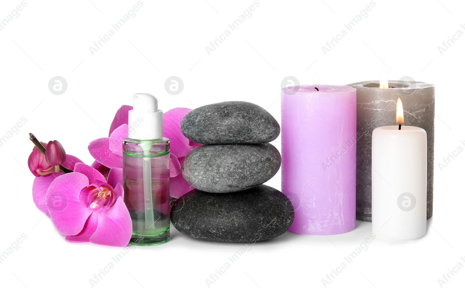 Photo of Composition with spa stones and candles on white background