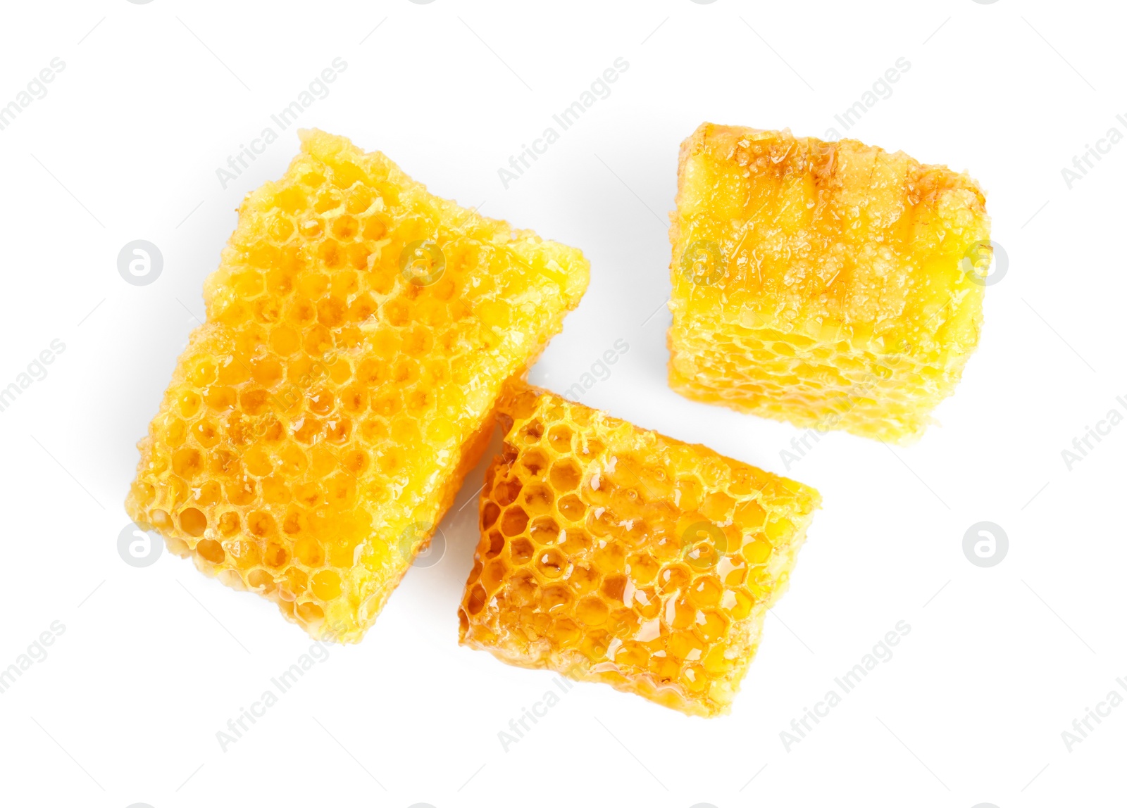 Photo of Fresh delicious sweet honeycombs isolated on white, top view