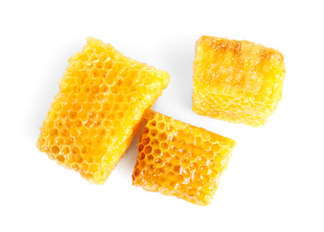 Photo of Fresh delicious sweet honeycombs isolated on white, top view