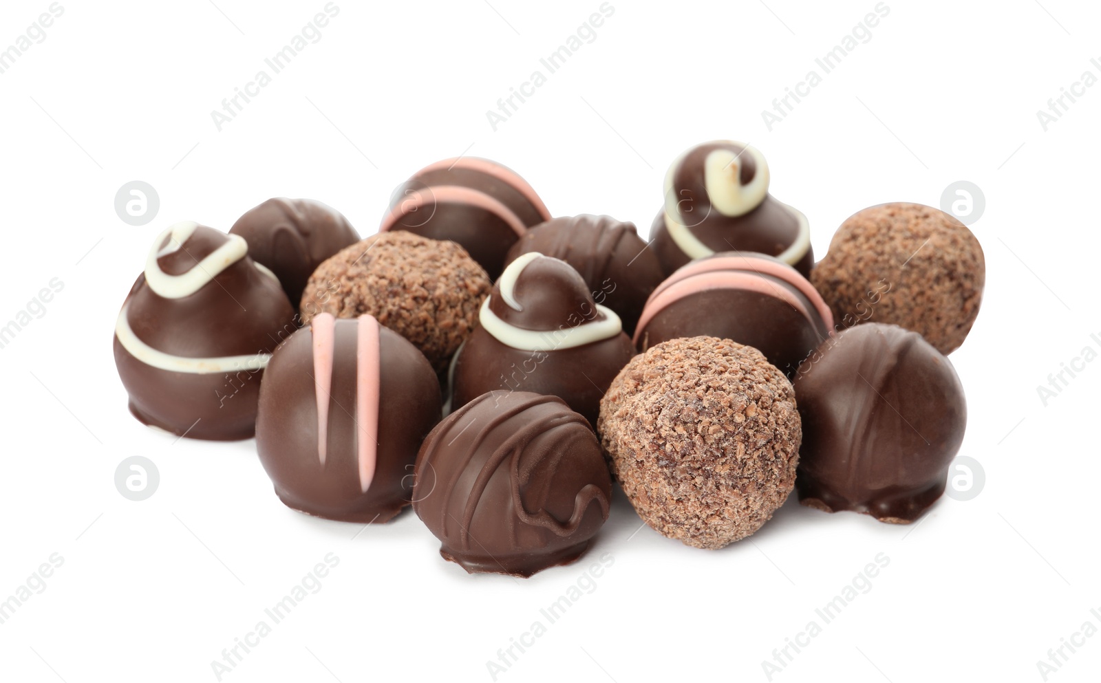 Photo of Many different delicious chocolate truffles on white background