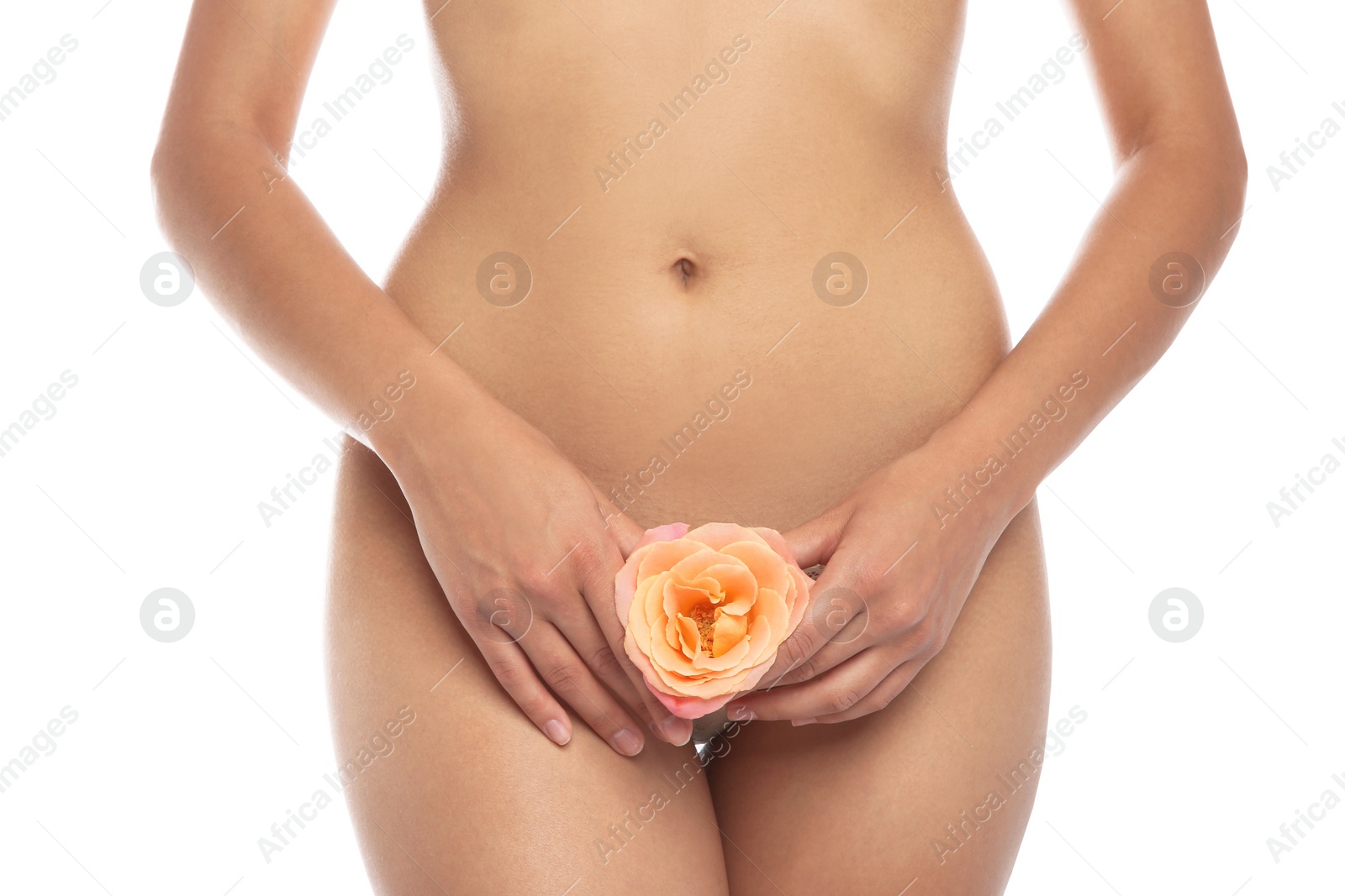 Photo of Young woman with flower showing smooth skin after bikini epilation on white background