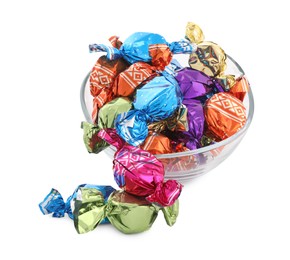 Photo of Bowl with sweet candies in colorful wrappers on white background