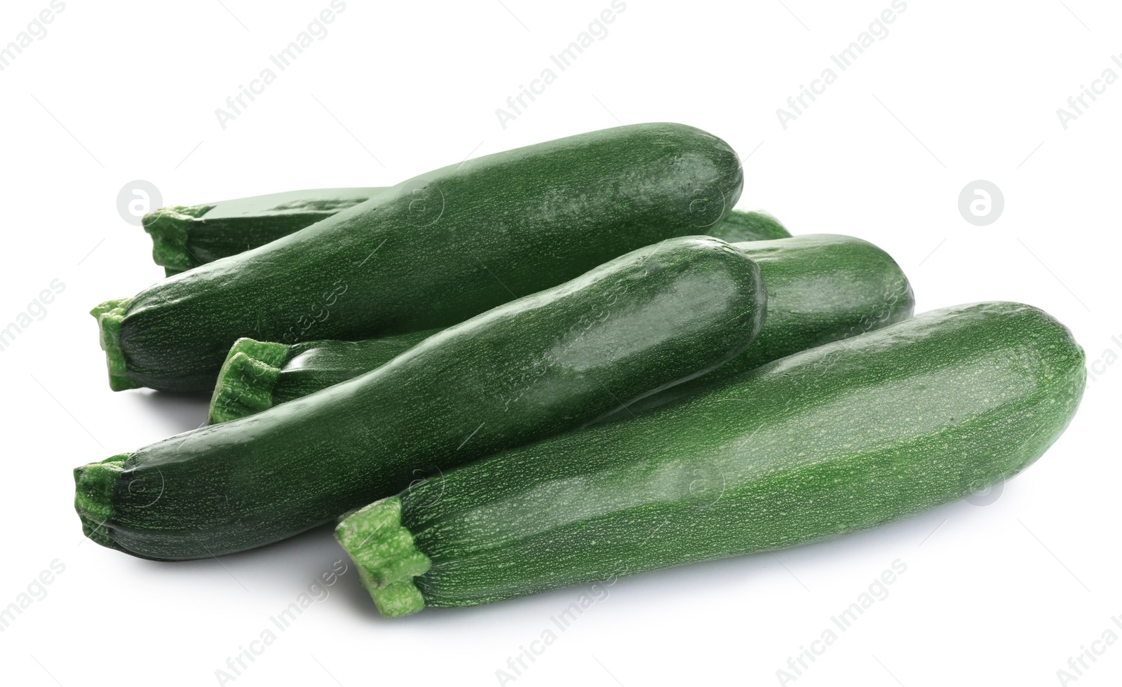 Photo of Fresh ripe green zucchinis isolated on white