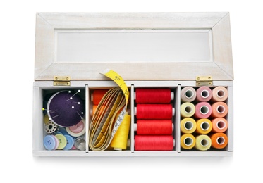 Container with set of color sewing threads on white background