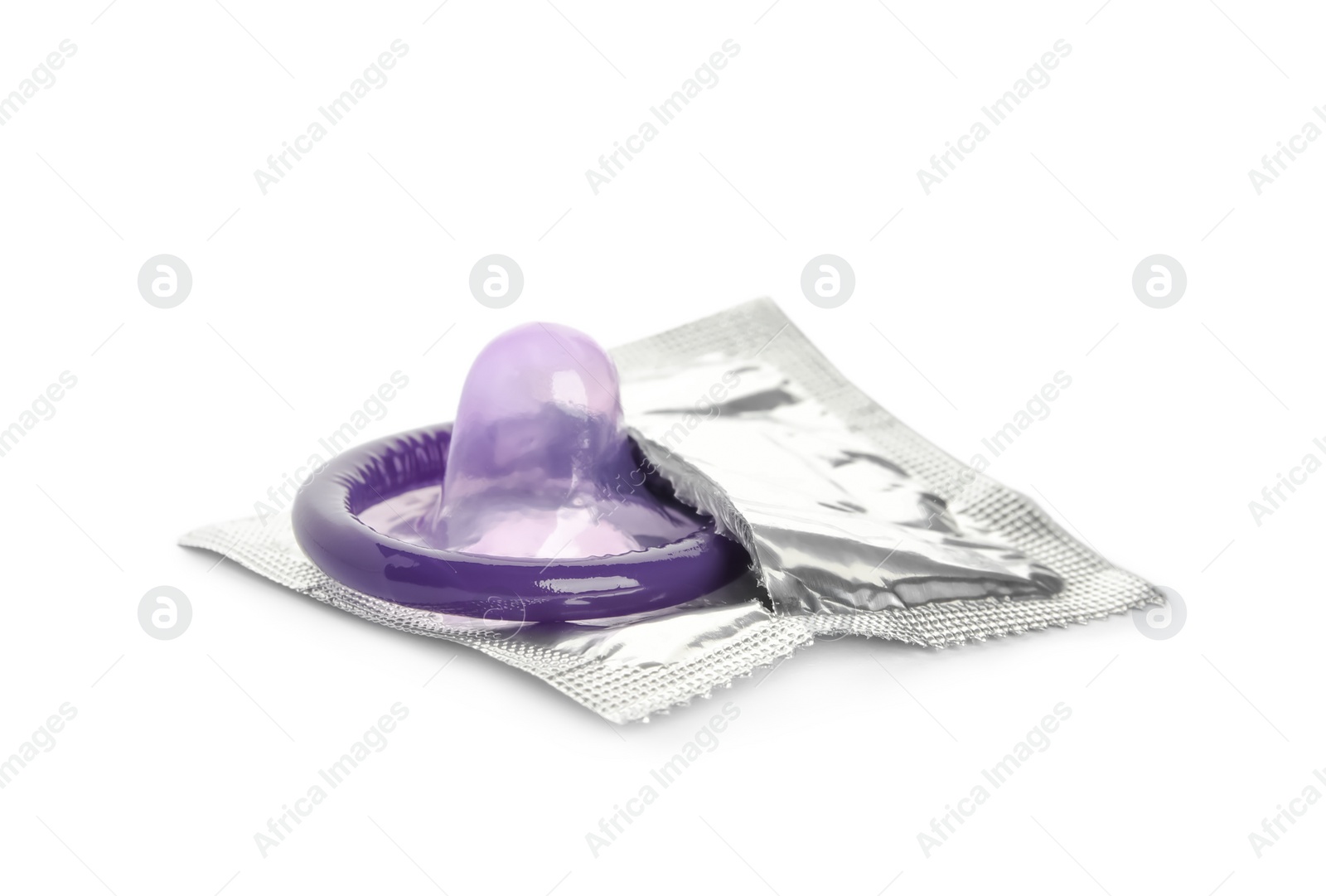 Photo of Unpacked purple condom isolated on white. Safe sex