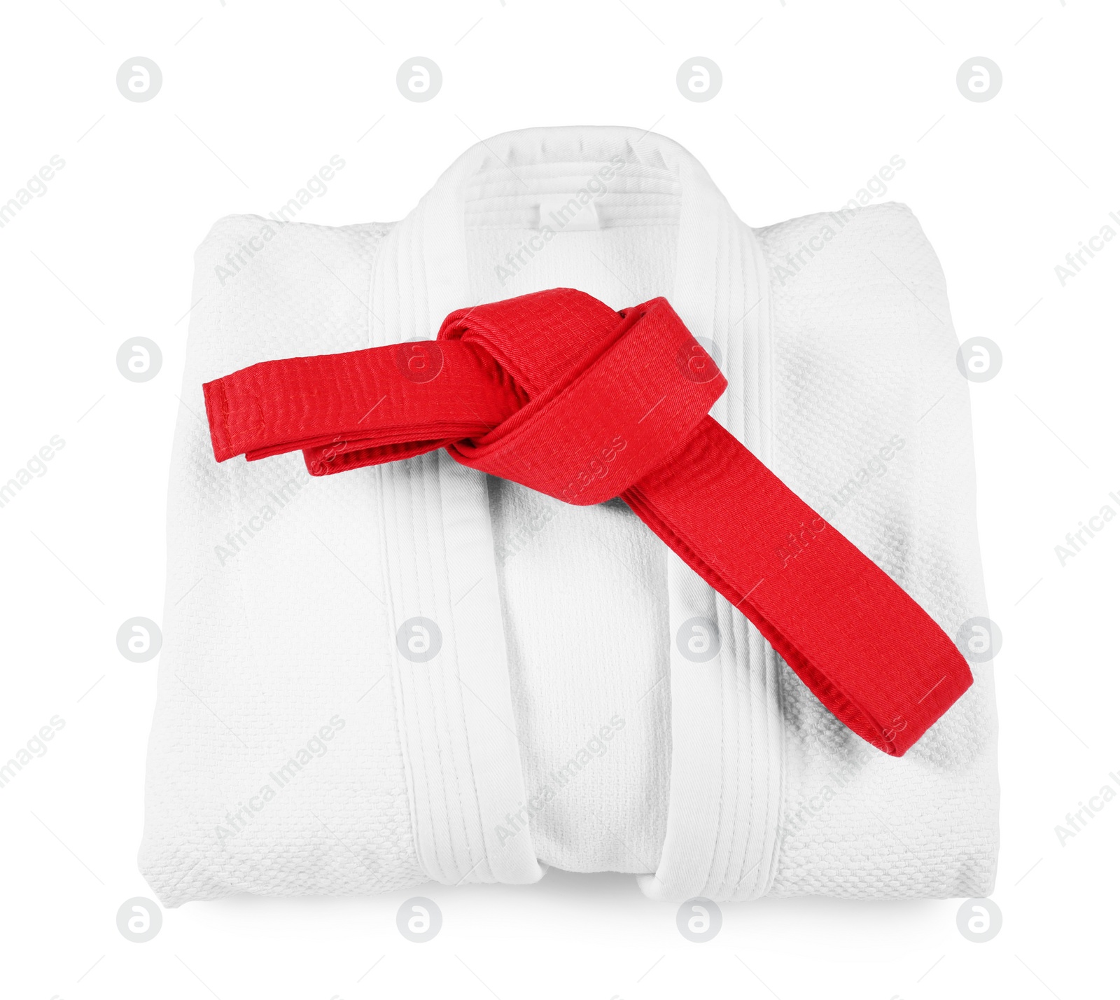 Photo of Red karate belt and kimono isolated on white