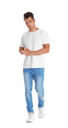 Photo of Young man in stylish jeans on white background