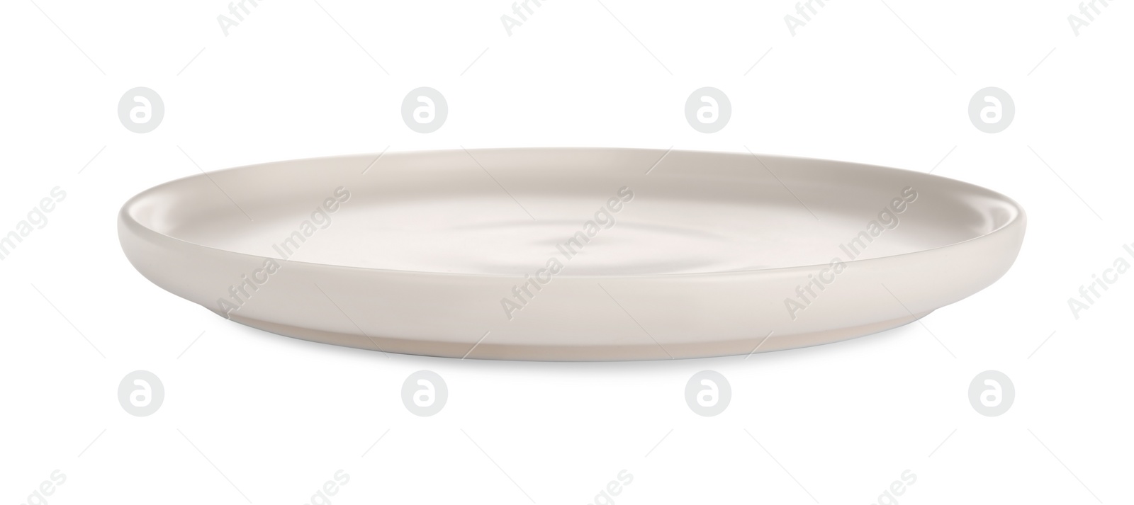 Photo of Empty beige ceramic plate isolated on white